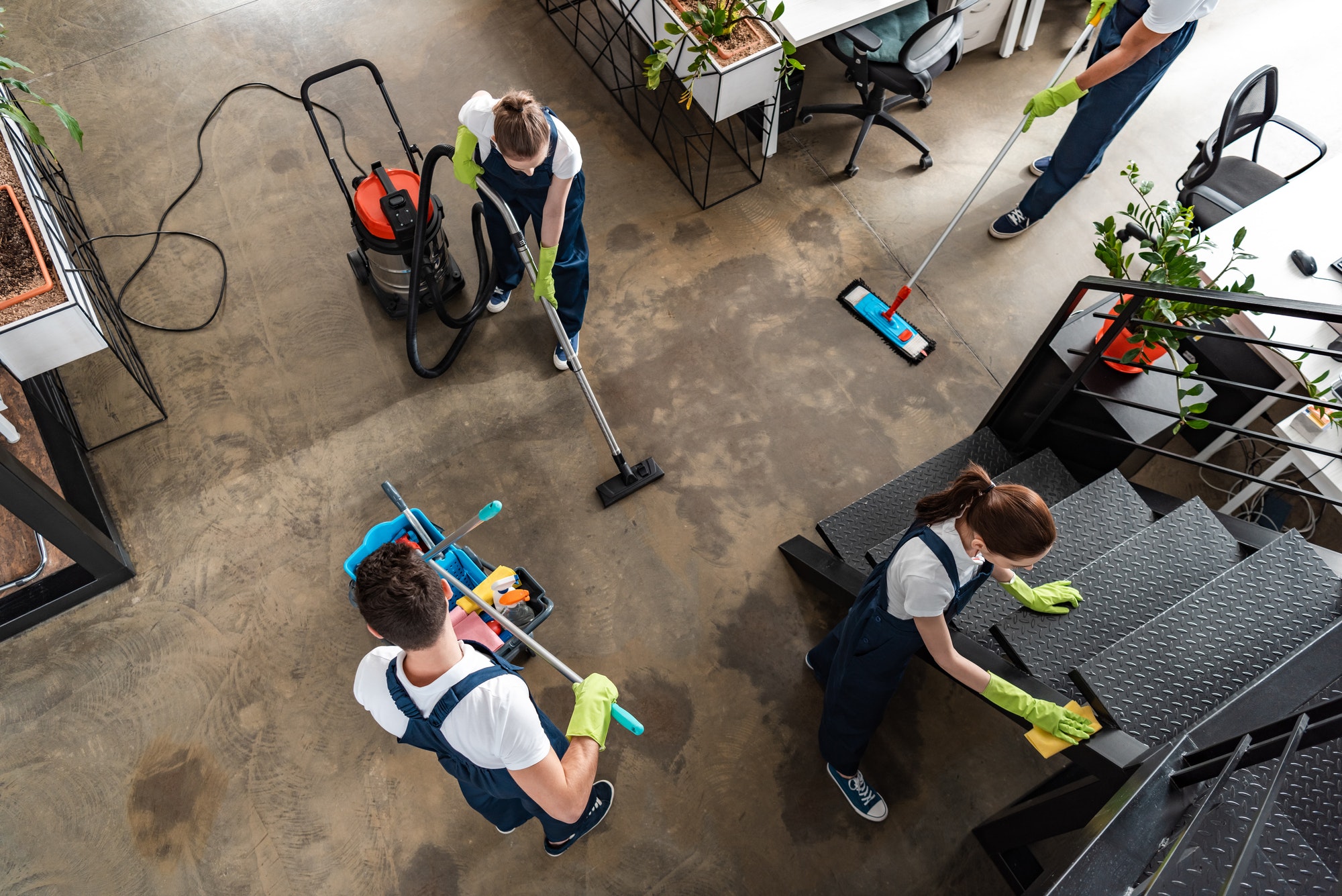 top-view-of-cleaning-company-team-cleaning-modern-office.jpg